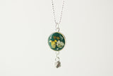 Silver and Dark Green Circle Dangle Necklace with Yellow Flowers