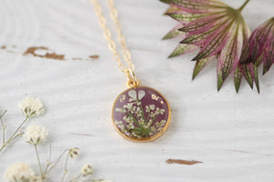 floral resin and clay necklace in gold