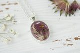 floral resin and clay necklace in gold