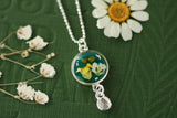 Silver and Dark Green Circle Dangle Necklace with Yellow Flowers