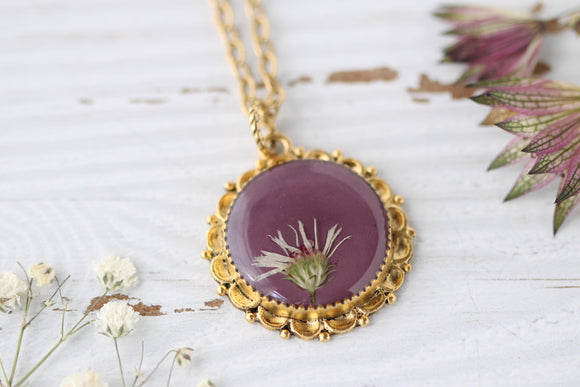 floral resin and clay necklace in gold